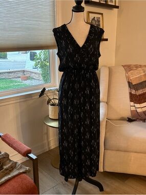 Black V-Neck Jumpsuit with Subtle Pattern